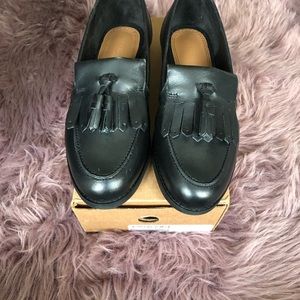 Black platform loafers